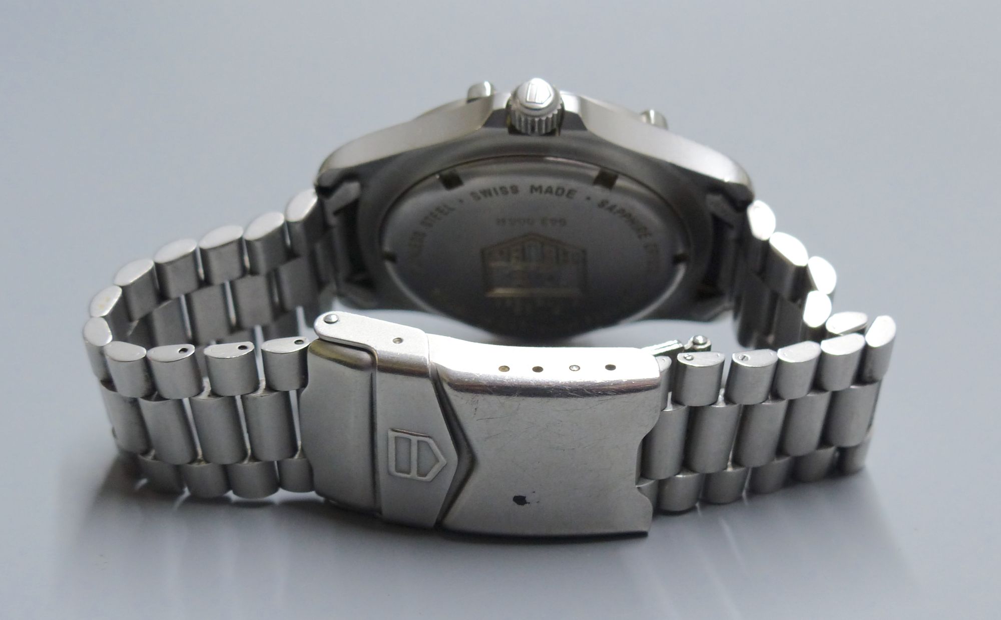 A gentlemans modern stainless steel Tag Heuer Professional quartz wrist watch, on stainless steel Tag bracelet,